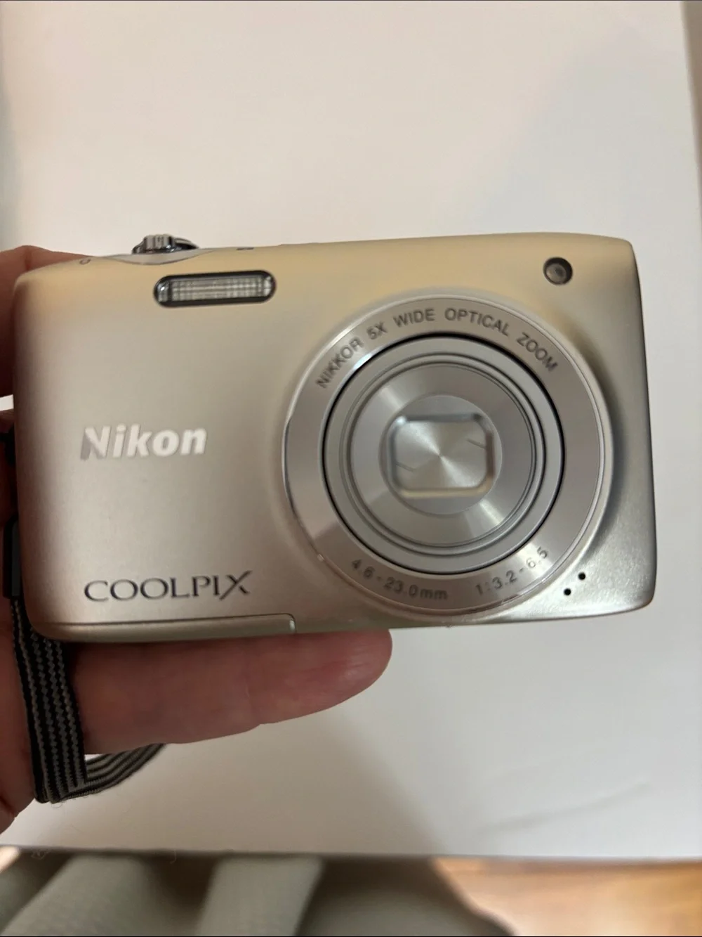 Nikon Coolpix S3100 camera with charger box and everything shown